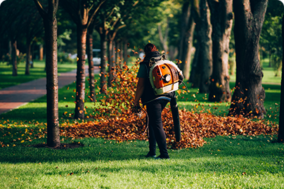 woman operating heavy duty leaf blower